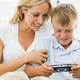 Illustration for article titled Guy Teams Up With His Mother To Defend Video Games